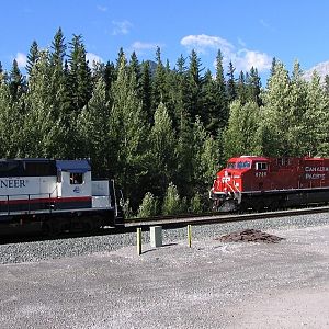 Westbpund Rocky Mountaineer meeting Eastbound Stack train at Gap siding
