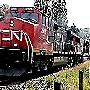 C N 2606 and 5744 at speed westbound at Fort Langley on a container train