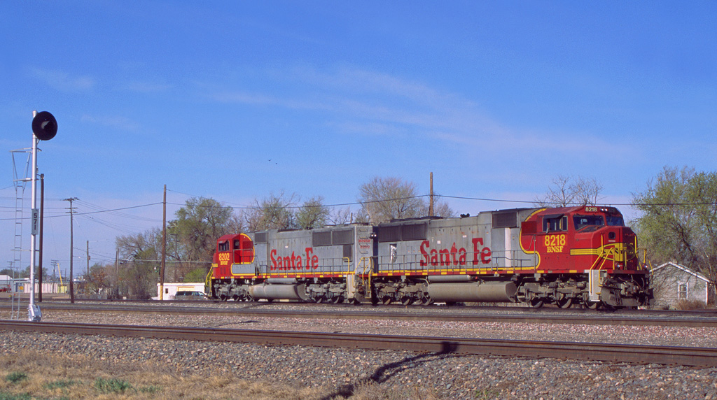 A Pair Of SD75M's In Warbonnet Colors