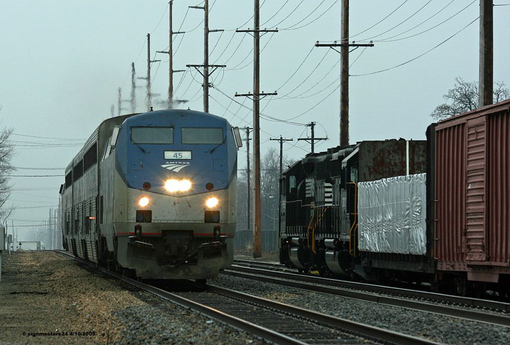 Amtrak 365 passes NS B05 in Dowagaic, MI