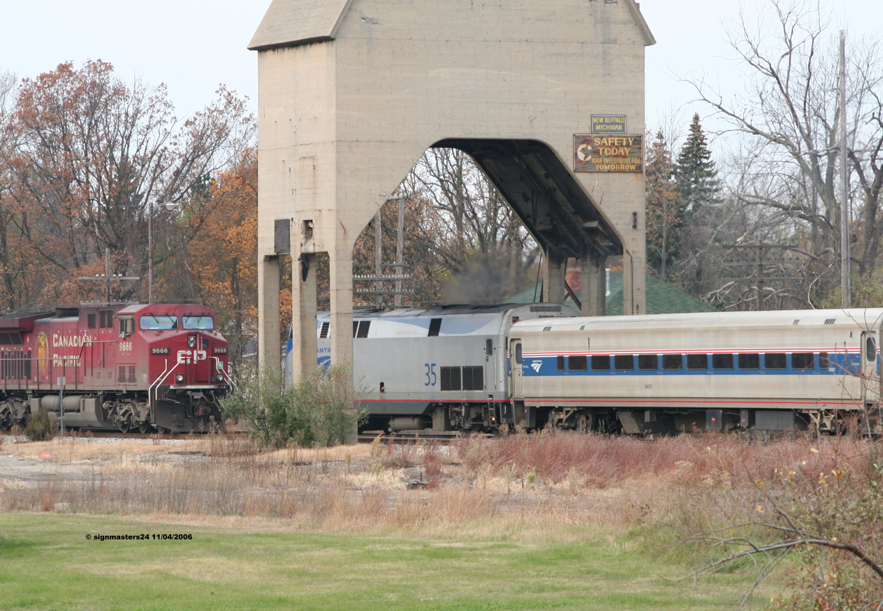 Amtrak P371 and CP #9666 meet at the coaling tower in New Bufffalo