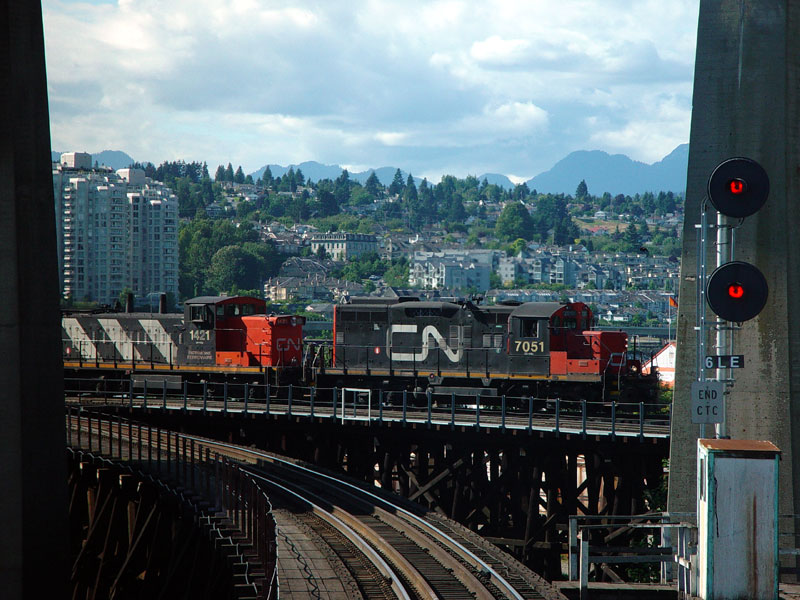 CN 7051 is crossing the Fraser River