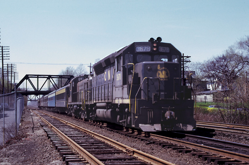 CNJ 3679 leads commuter train at Elizabeth, NJ