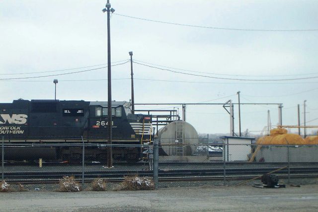 The cab of a Norfolk Southern SD70M