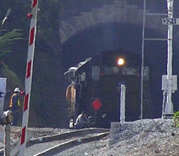 The South City Switcher Emerging from a Tunnel