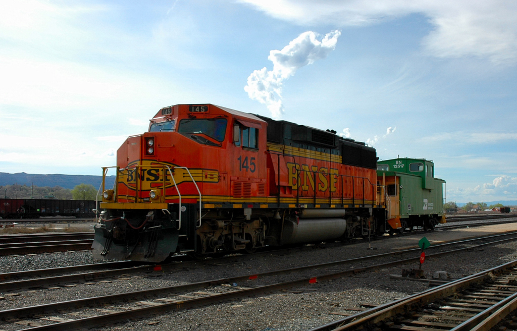 A BNSF GP60 M And Clean Caboose