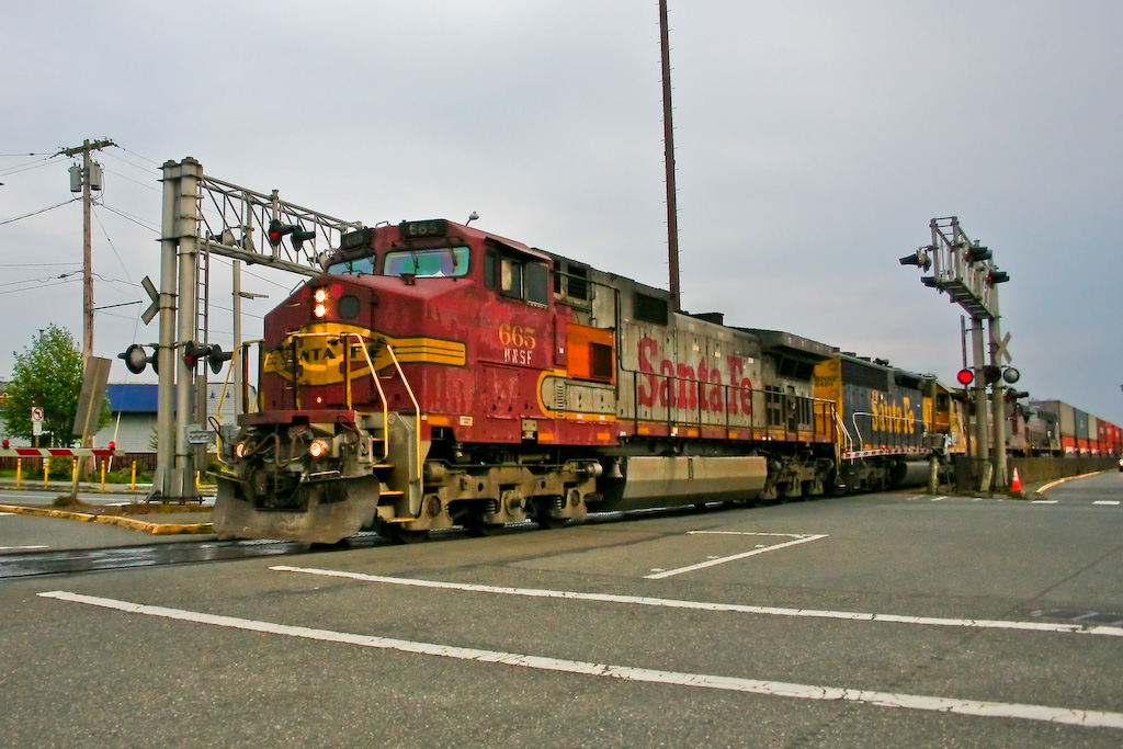 A BNSF Stack Train with a Unique Lash Up.