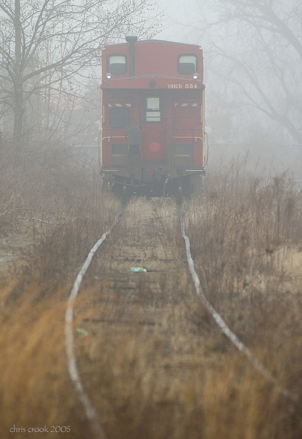 Caboose in the fog.