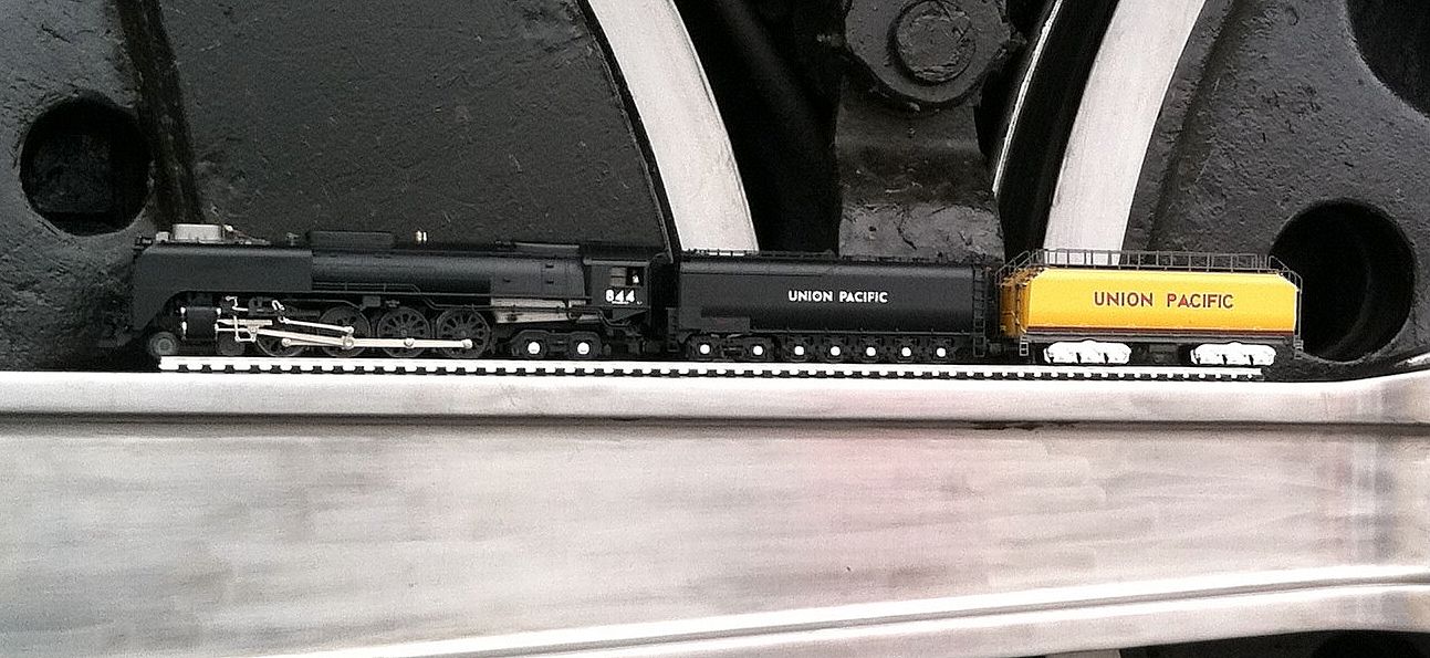 Little 844 closeup against Big 844 drivers/con rod