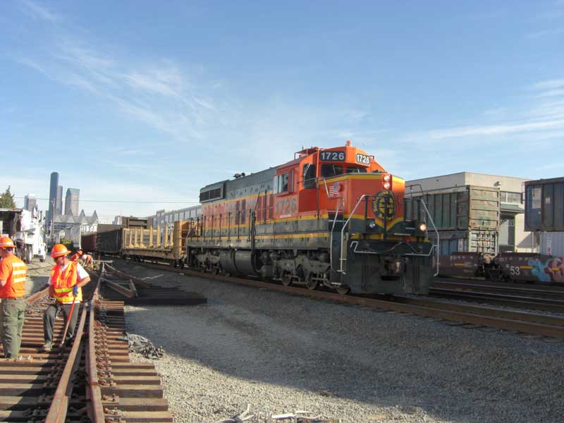 Seattle job rolling by a track construction