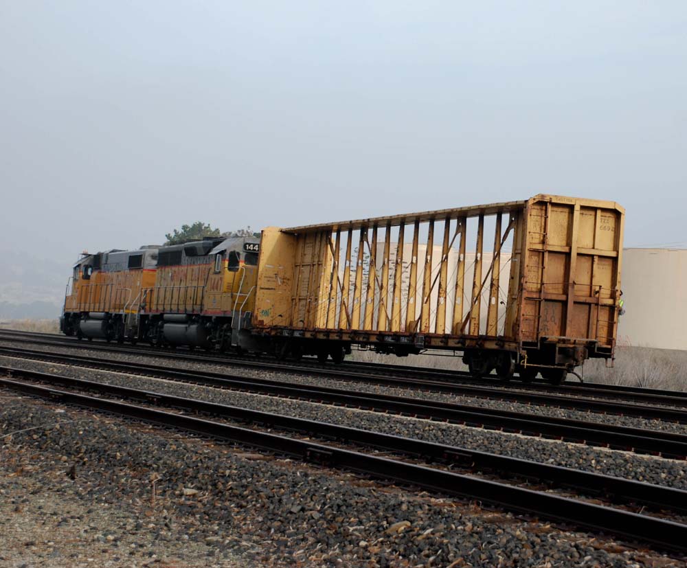TWO ENGINES AND ONE LUMBER CAR