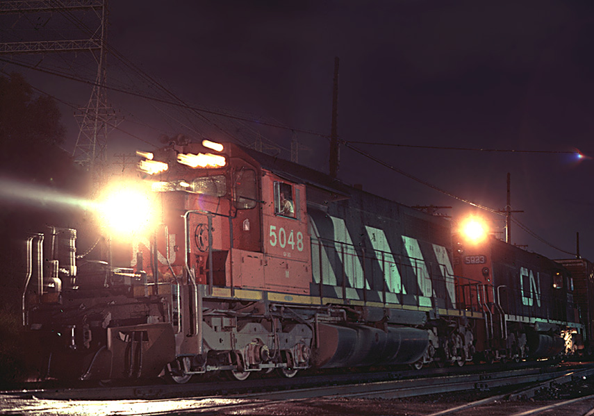 Westbound Milw Road train w/ CN power